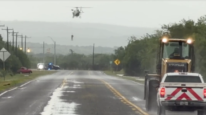 Emergency crews respond to flash flooding near Camp Wood, Texas, on July 15, 2026.