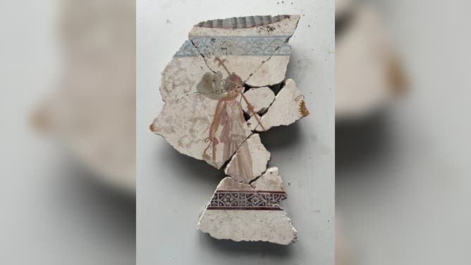 Pieces of fragments from fresco in a home in Pompeii, Italy.