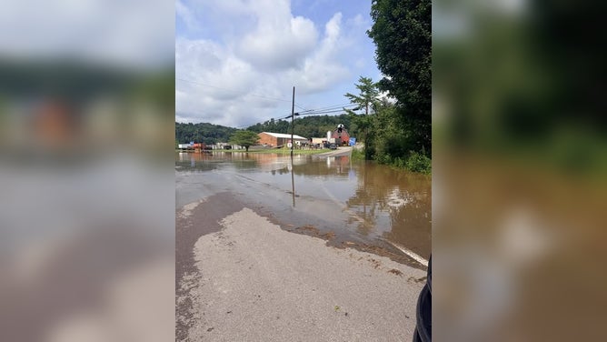 Floodwaters linger Wednesday across parts of West Virginia after a Flash Flood Emergency on Tuesday, July 21, 2026.