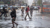 Another round of storms threatens the East Coast with heavy rain and flooding amid sweltering summer heat