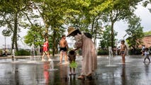 Tropical humidity grips the East Coast as millions along the I-95 corridor deal with intense summer heat