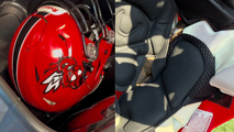 Close call: Young football player finds venomous snake inside helmet before practice