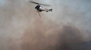 Crews race to contain deadly wildfires burning across Texas and Nevada amid dangerous fire weather