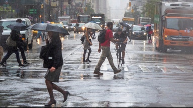 Another round of storms threatens the East Coast with heavy rain and flooding amid sweltering summer heat