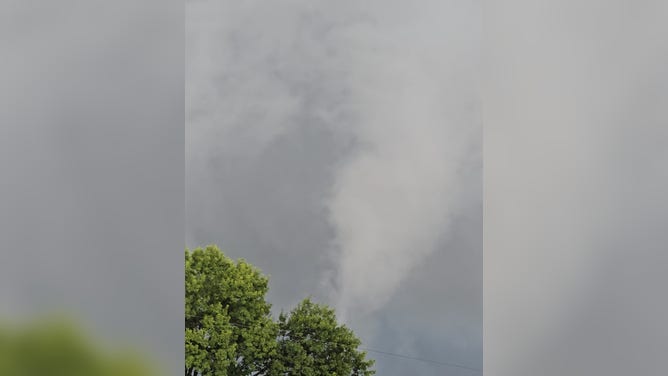 Tornado-warned storms loom over Yorktown, Indiana, on Wednesday, Aug. 20, 2026.