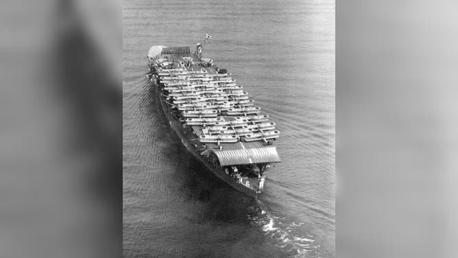 Japan: Imperial Japanese Navy aircraft carrier Akagi off Osaka, 15 October 1934. On deck are Mitsubishi B1M and B2M bombers.