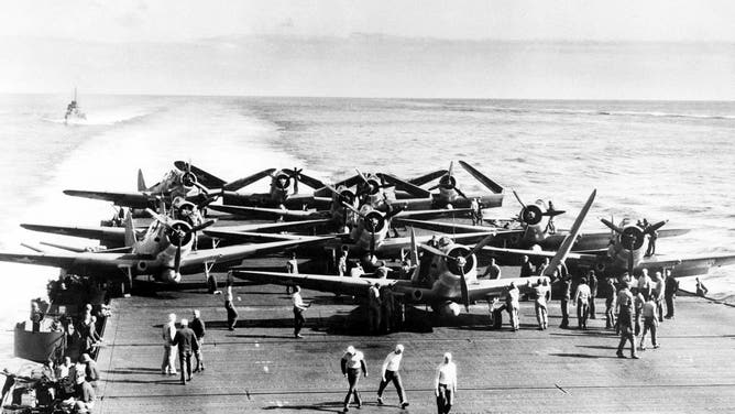 USA/Japan: TBD-1 torpedo bombers on the deck of USS Enterprise before launching an attack against four Japanese carriers in the Battle of Midway, 4 June, 1942. The squadron lost ten of fourteen aircraft during the attack.