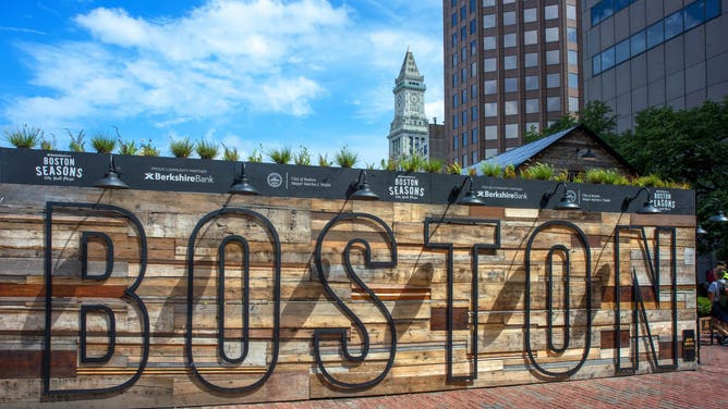 Giant letters at sign at City Hall Plaza welcome you to Boston Massachusetts