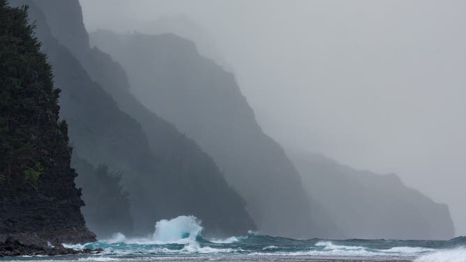 Bizzare wave shapes created by colliding outgoing and incoming waves off the Na Pali Coast on Kauai, Hawaii.
