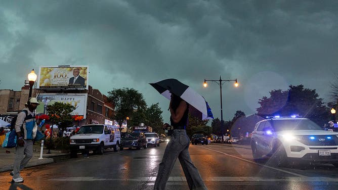 A line of severe storms rolls into Chicagoâs Austin neighborhood from the west along West Madison Street on Tuesday, Aug. 11, 2026.