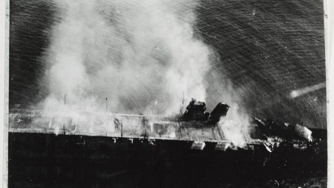 Japanese aircraft carrier Hiryu burning.