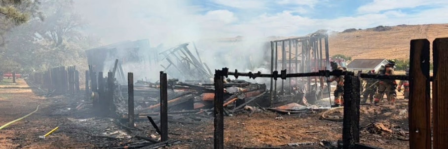 Crews work to contain human-caused Hawk Fire that has destroyed dozens of homes, forced thousands to evacuate