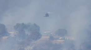 2 injured, evacuations underway as brush fire engulfs homes in Los Angeles County
