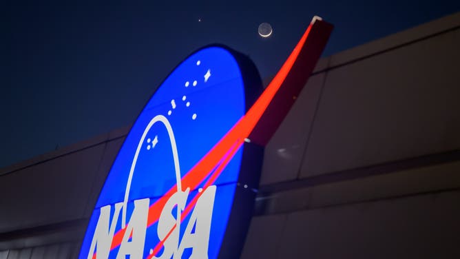 The Moon and Venus, left, are seen in conjunction, Monday, May 18, 2026, from the Mary W. Jackson NASA Headquarters Building in Washington.