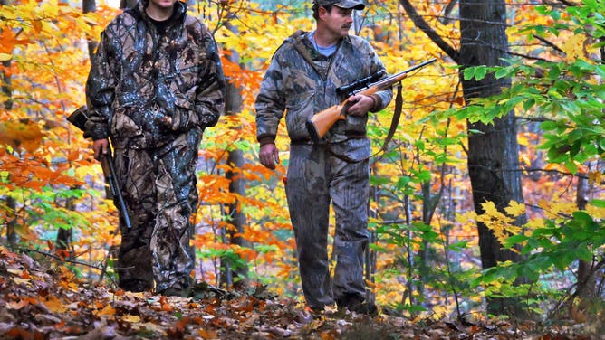 Times Union staff photo by John Carl D'Annibale: Herbert Spalding,at right, and his son Josh Spalding, both of Ballston Spa, deer hunt in Middlegrove Tuesday afternoon October 23, 2007. Deer hunting season in the Northern Zone opened October 20.