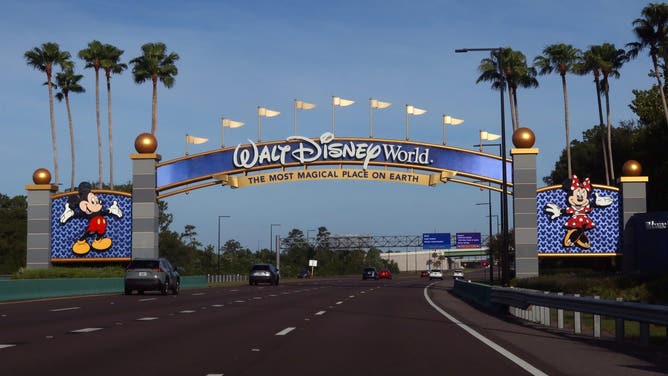 ORLANDO, FL - JUNE 1: Cars enter the grounds of Walt Disney World on June 1, 2024, in Orlando, Florida