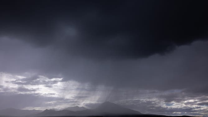 CORTEZ, COLORADO - AUGUST 24: Rain clouds pass overhead as monsoon season storms persist on August 24, 2024 near Cortez, Colorado. A shift in wind direction from westerly to southerly typically triggers the American Southwest monsoon by mid-June and runs through September, bringing storms of often-spectacular cloudbursts that produce widespread flash floods and dangerous lightning.