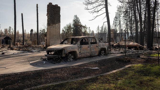Damage is seen on August 10, 2026, after the Old Trails Fire swept through multiple neighborhoods in Spokane, Washington.