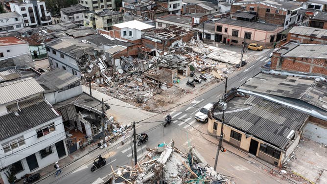 This aerial view shows the rubble and debris of collapsed buildings 14 days after the 7.4-magnitude earthquake in Pereira, Colombia on August 24, 2026.