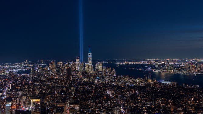 NEW YORK, NY - SEPTEMBER 8: The Tribute in Light is illuminated over the skyline of lower Manhattan and One World Trade Center, as seen from the Empire State Building, ahead of the 25th anniversary of the September 11 attack on the World Trade Center on September 08, 2026, in New York City.