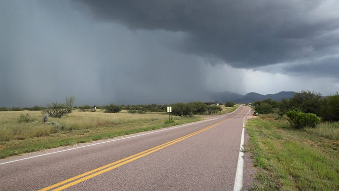 BENSON, AZ - SEPTEMBER 29: A heavy rain storm approaches on September 29, 2016 near Benson, Arizona. Stoms have greened traditionally dryer areas north of the U.S.-Mexico border.