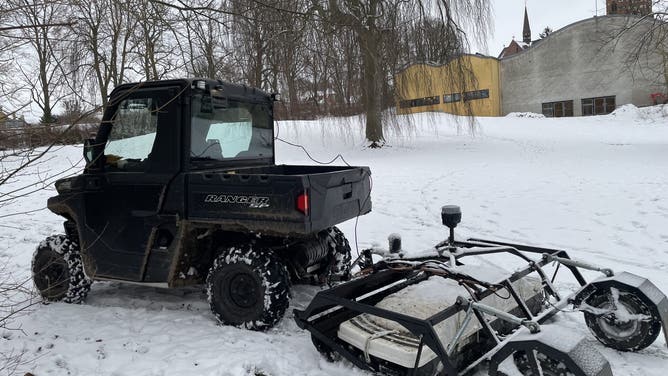 Crews conduct Ground Penetrating Radar imaging of the soccer field in Denmark.