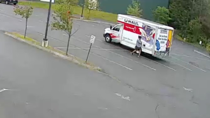 The animal attacked the man as he got out of his U-Haul.