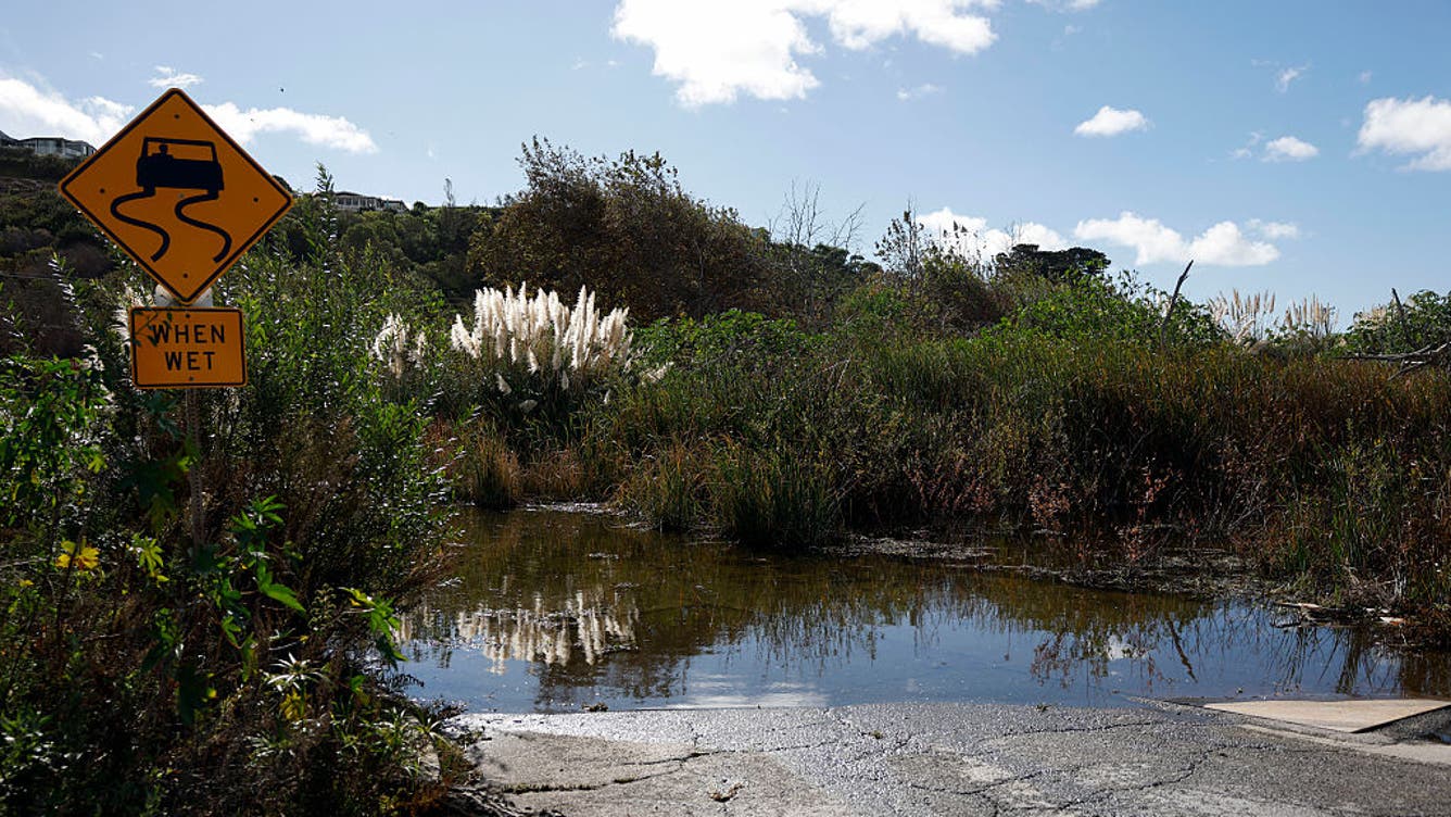Floodwater from recent rains covers a roadway in Malibu, California, on October 22, 2026.