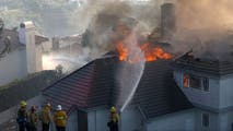 Homes scorched, firefighters injured in California wildfires fueled by first Santa Ana wind event of season