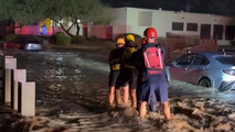 See It: Phoenix Fire Department saves stranded drivers from raging floodwaters as powerful storms slam region