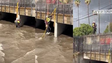 Watch: 3 rescued from rushing floodwaters as heavy rain swells Los Angeles wash