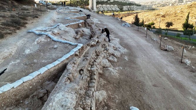 Crews work to preserve a 2,000 year old aqueduct in Israel.