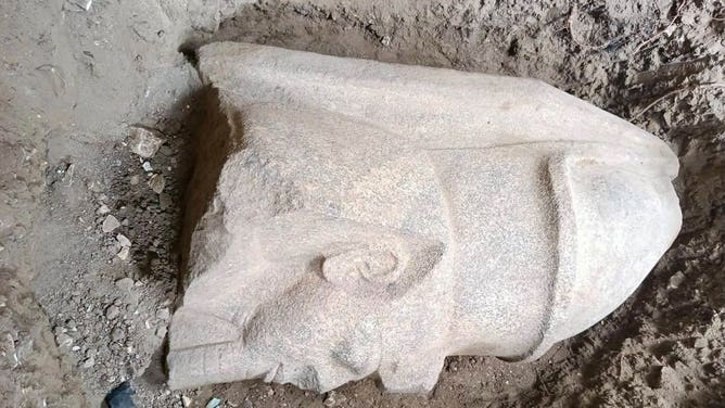 Statue head of King Ramses II in remarkable condition.