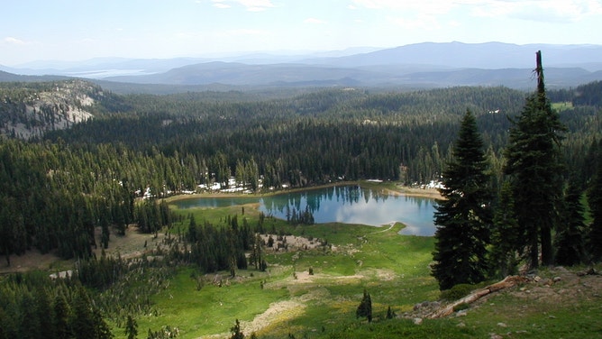 Crumbaugh Lake as seen from the trail to Bumpass Hell from Kings Creek Picnic Area just past Cold Boiling Lake.
