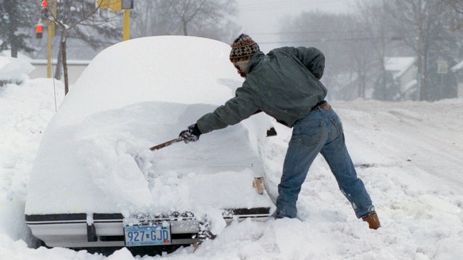 Halloween Blizzard, 1991. FILE PHOTO Minneapolis resident digs out on Nov 1, 1991.