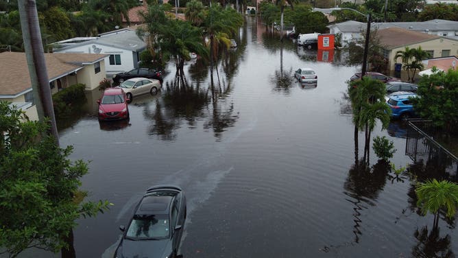 HALLANDALE, FLORIDA - DECEMBER 23: An aerial view from a drone shows a street inundated with flood water on December 23, 2019 in Hallandale, Florida.
