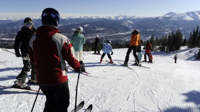 Skiers enjoy a great view at the top of the Independence SuperChair at the Breckenridge Ski Resort Saturday, February 4th, 2012. Andy Cross, The Denver Post.