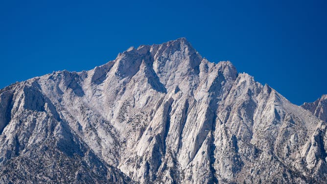 FILE - LONE PINE, CA - SEPTEMBER 22: General views of Mount Whitney, the highest mountain in the contiguous U.S., against the Alabama Hills rock formations, a wide area filming location for hundreds of iconic Hollywood Western films and TV shows on September 22, 2024 in Lone Pine, California.