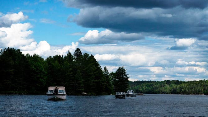 VOYAGEURS NATIONAL PARK, MN June 15, 2024: National Park Service boats and Biologist during the search for bald eagles nest and eagle chicks in Voyageurs National Park, Minnesota on Saturday, June 15, 2024.