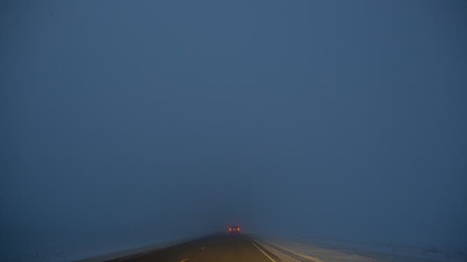 NORTH DAKOTA - DECEMBER 3: Driving on a road in near white out conditions, December 3, 2016 in rural North Dakota.