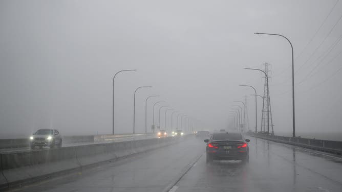 CALIFORNIA, USA - APRIL 11: A view of cars commuting on San Mateo Bridge during heavy weather in San Mateo, California, United States on April 11, 2026.