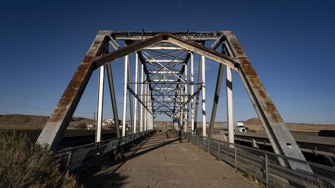 ALBUQUERQUE, NM - APRIL 18: The Rio Puerco Bridge, a Parker through truss bridge, located on the historic U.S. Route 66 and opened in 1933, on April 18, 2026 in Albuquerque, New Mexico. A hundred years later, Route 66 still feels like the ultimate road trip. Its neon signs, roadside stops, and wide-open stretches keep its spirit alive. Even after a century, the "Mother Road" is all about freedom, adventure, and the joy of the journey.