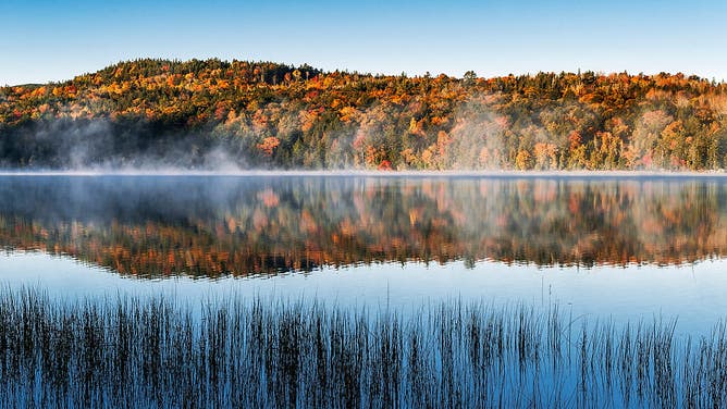 ACADIA NATIONAL PARK, MAINE, UNITED STATES - 2010/10/13: Echo Lake in autumn color. 