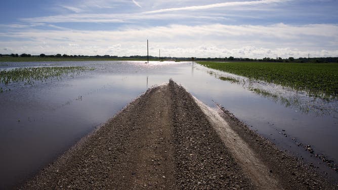 Emporia, Kansas 5-17-2015 Flooded road in Lyon County Kansas day after heavy thunderstorms and small tornado in the area