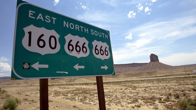 A highway sign in southeast Colorado lists Route 666 which goes nearly 200 miles through parts of New Mexico, Colorado and Utah. Lawmakers in those states have asked for a name change. The Highway 666 signs are being stolen often.