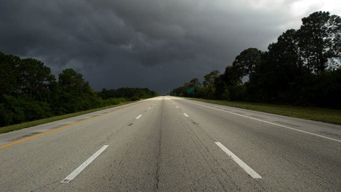 FT. PIERCE, FL - SEPTEMBER 3: A normally busy Interstate 95 is empty under gathering storm clouds September 3, 2004 near Ft. Pierce, Florida. Residents of central and southern Florida are bracing for Hurricane Frances, downgraded from a Category 4 storm packing 145 mph on Thursday to a still-strong Category 3 storm with sustained winds at 115 mph. Two and a half million residents were told to evacuate on Thursday.