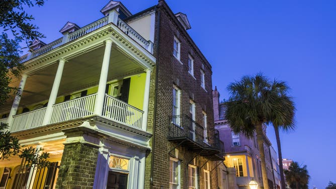 South Carolina, Charleston, Historic Downtown, Broad Street, Charleston single house at dusk.