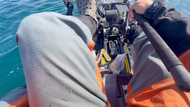 Paddling away after the shark disappeared.