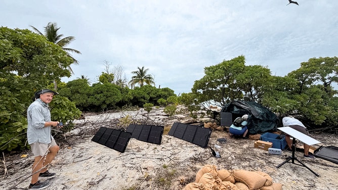 Crews set up area to conduct research at Nikumaroro Island.